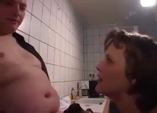 Dude fucking his mommy in the kitchen